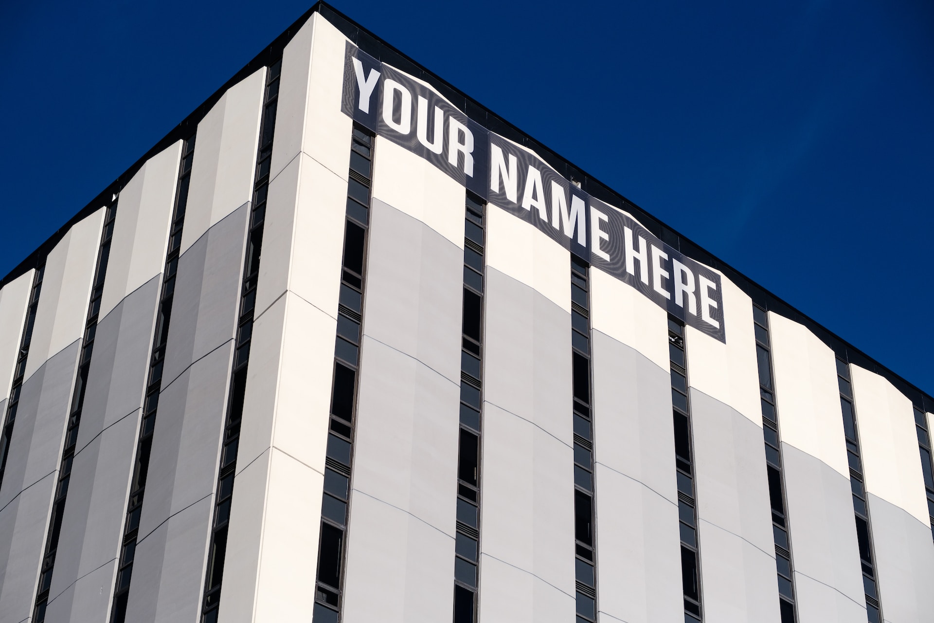 Name sign on the side of a building